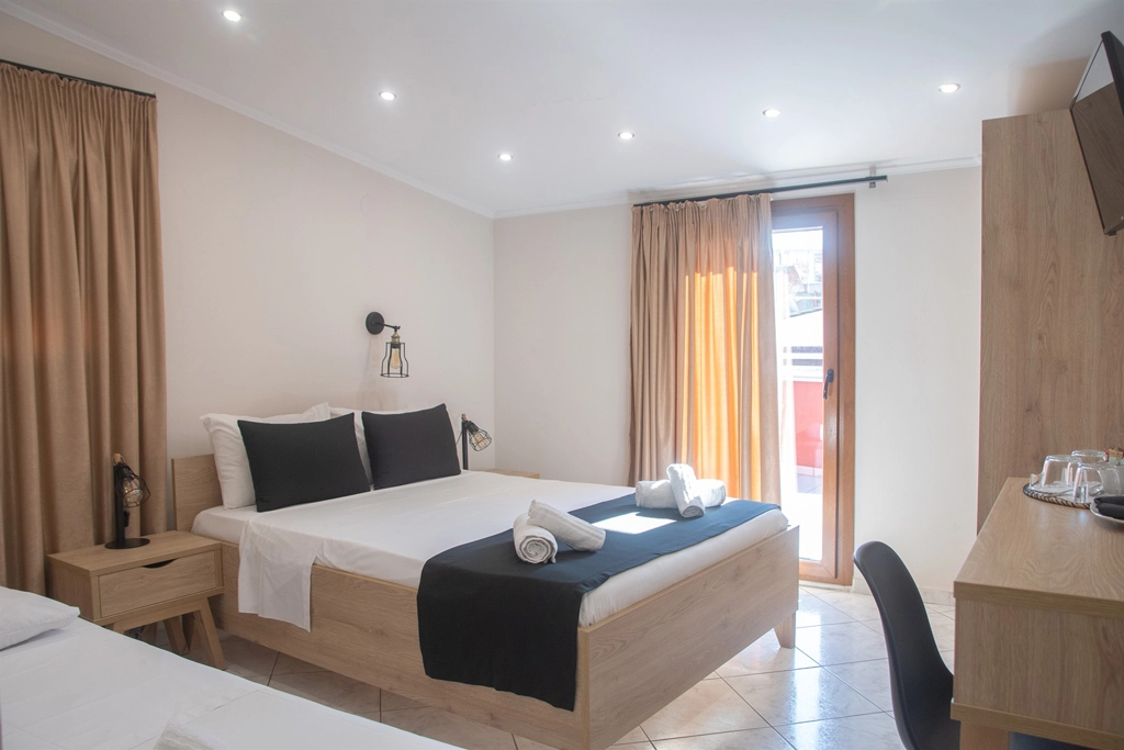 The same double room above the rooftops before retouching