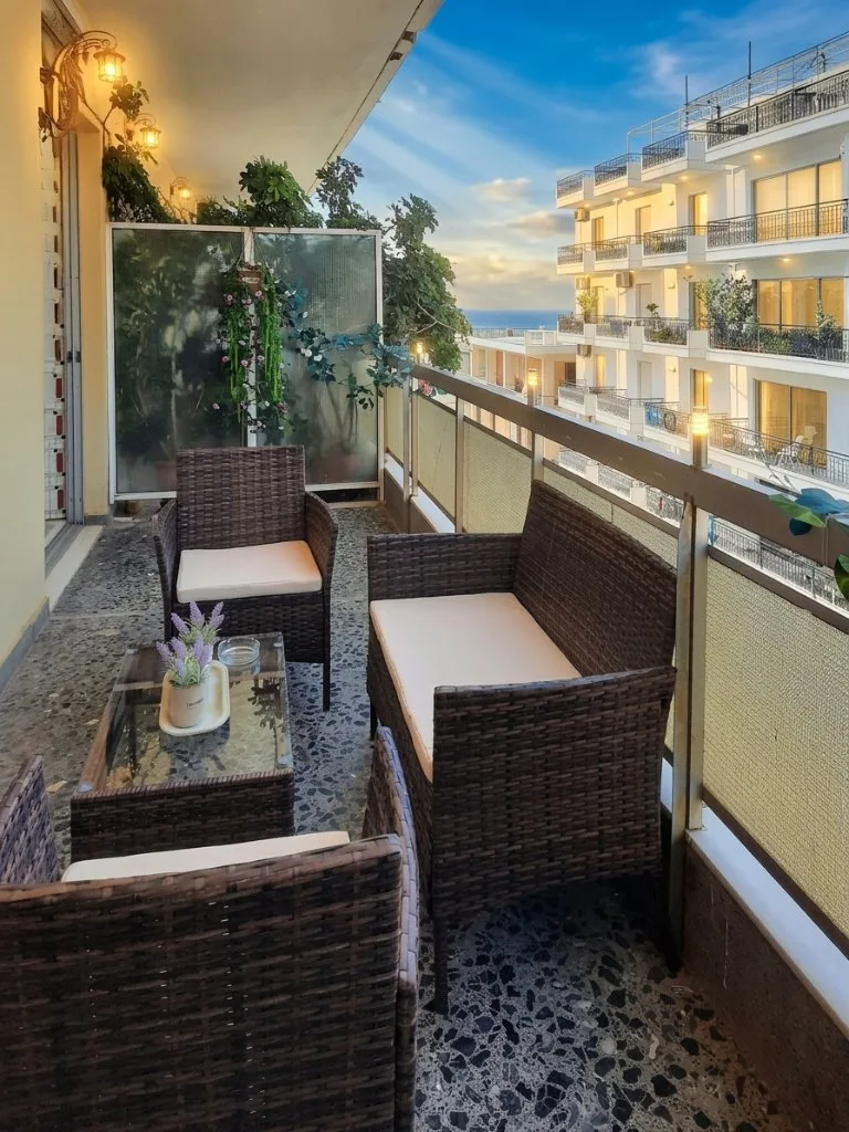 apartment balcony with sea view after AI photo enhancement — LuxLens AI