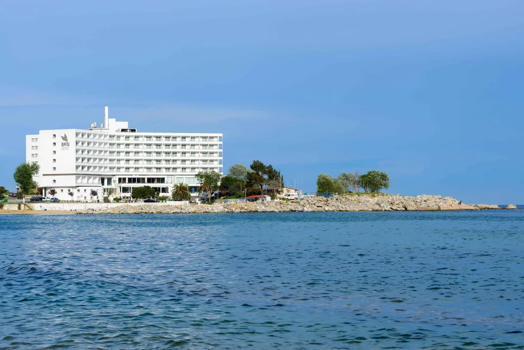 seafront hotel at sunset before AI photo enhancement