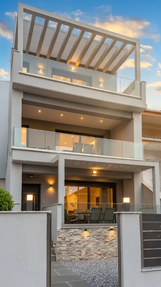 Apartment house facade at dusk after retouching