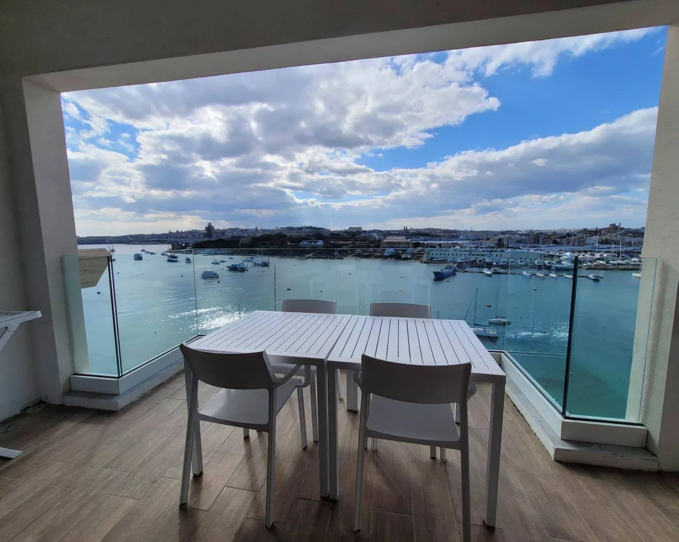 The same terrace above the harbour before retouching