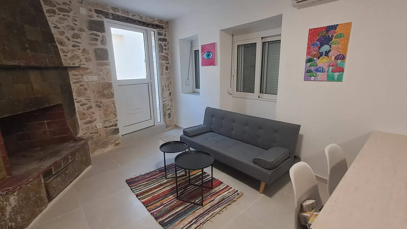 The same villa living room before retouching