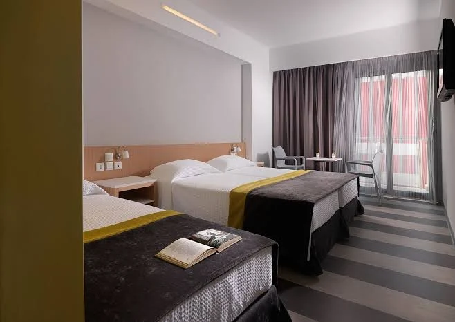 small cramped Airbnb room before AI perspective correction